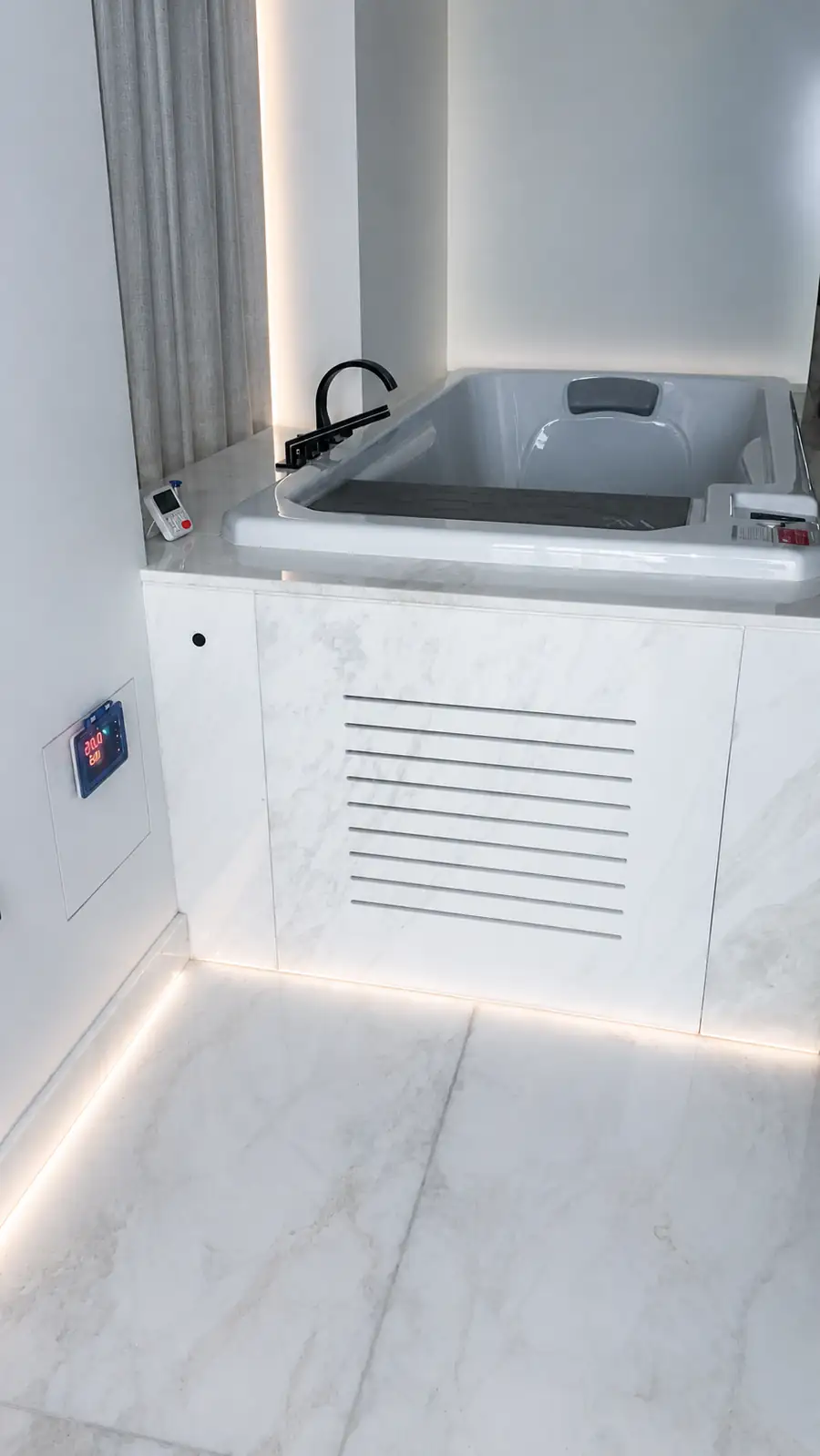 Built-in marble bathroom cold plunge with chiller vent