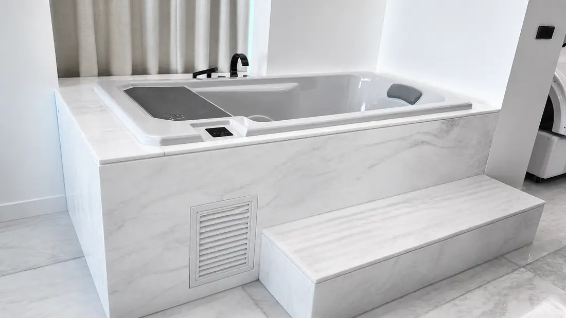 Marble-integrated cold plunge with step luxury bathroom Dubai